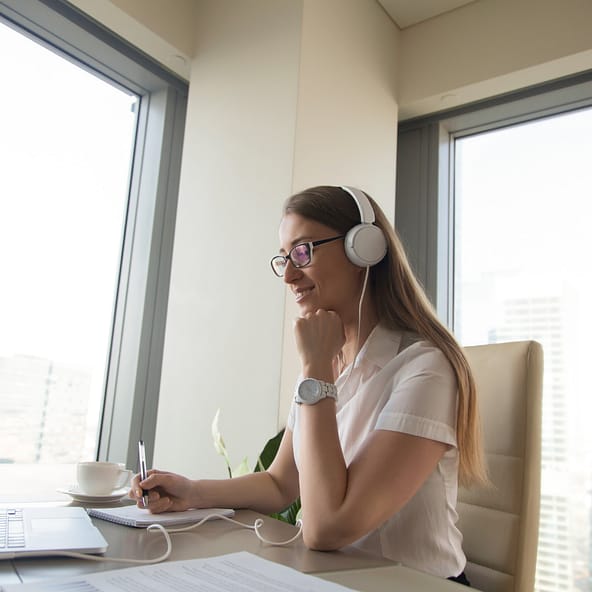 woman headphones laptop woman working online